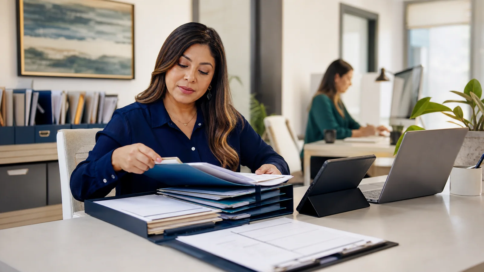 Administrative coordinator organizing property records and schedules